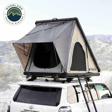 Load image into Gallery viewer, OVS LD TMON Clamshell Aluminum Hard Shell Roof Top Tent - 2 Person Capacity, Tan Body &amp; Green Rainfly